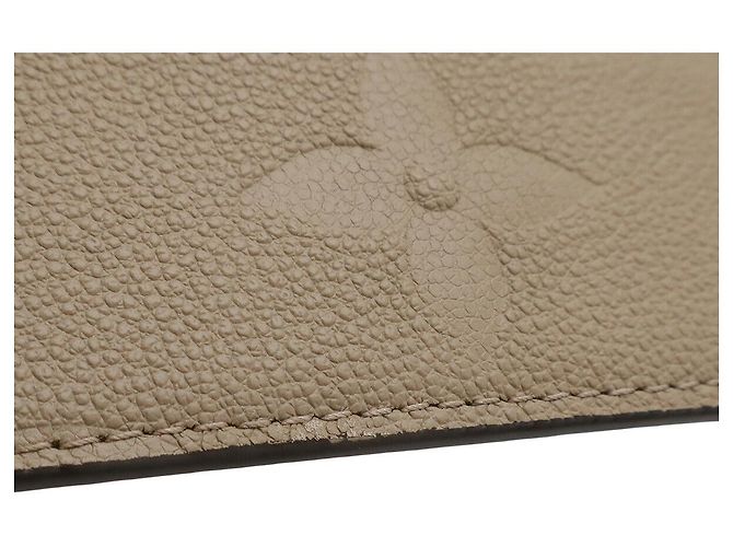 Pochette Louis Vuitton Neverfull Monogram Empreinte Beige - vista 4