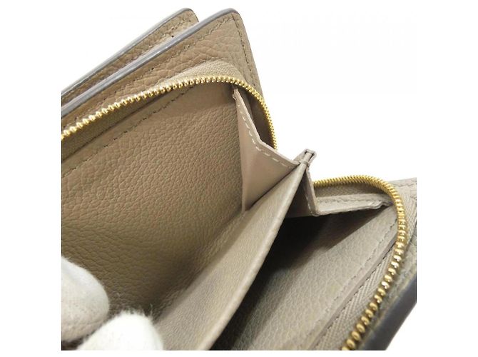 Portafoglio Louis Vuitton Bicolor Monogram Empreinte Claire Beige Grigio - vista 10