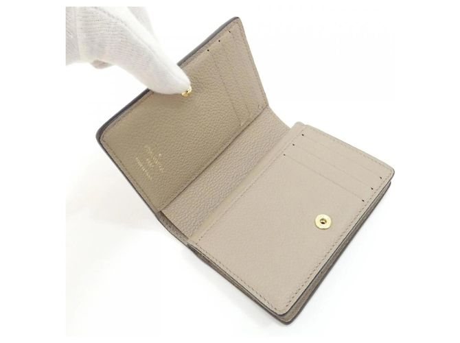 Portafoglio Louis Vuitton Bicolor Monogram Empreinte Claire Beige Grigio - vista 6