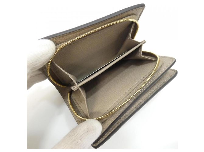 Portafoglio Louis Vuitton Bicolor Monogram Empreinte Claire Beige Grigio - vista 9