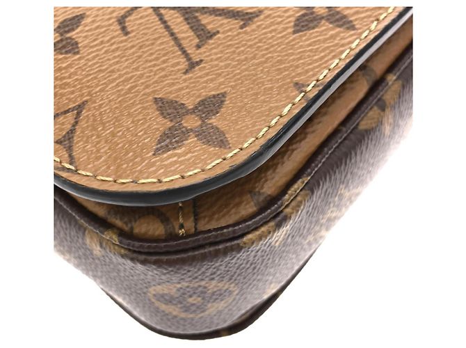 Louis Vuitton Monogram Reverse Pochette Métis MM Marrone - vista 3