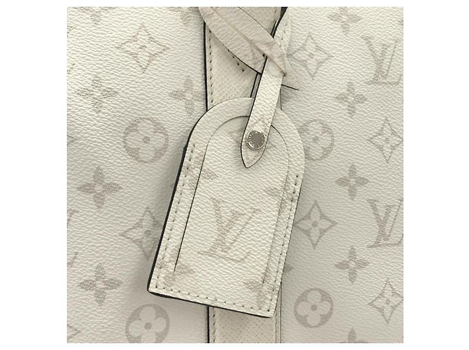Borsa Louis Vuitton Taiga Lama Weekend M30919 Bianco - vista 7