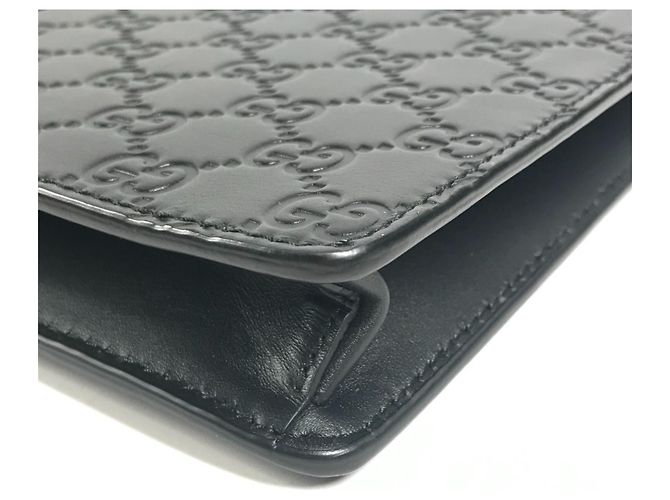 Clutch e borsa a tracolla in pelle nera con logo Gucci Guccissima GG Nero - vista 7