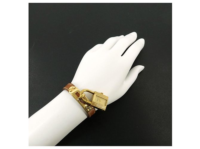 Orologio Hermès Kelly Oro e Marrone Acciaio Inossidabile - vista 3