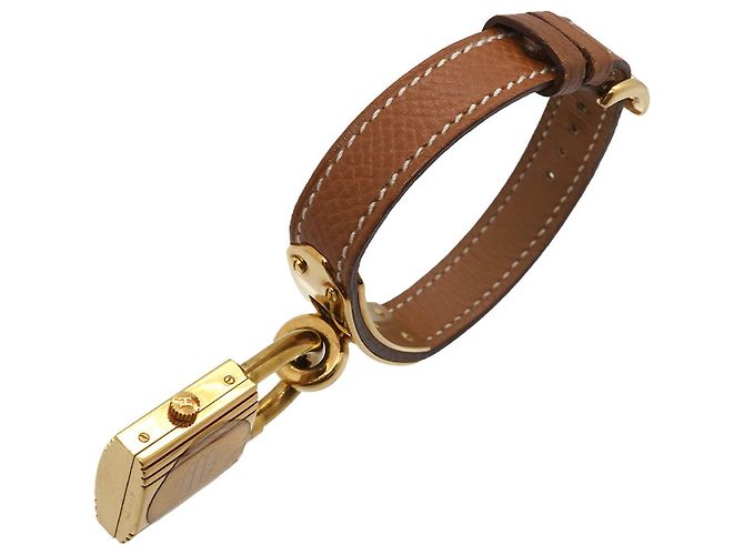 Orologio Hermès Kelly Oro e Marrone Acciaio Inossidabile - vista 6
