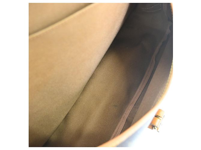 Louis Vuitton Saumur Monogram Canvas 35 Marrone - vista 3
