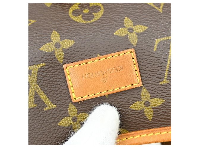 Louis Vuitton Saumur Monogram Canvas 35 Marrone - vista 4