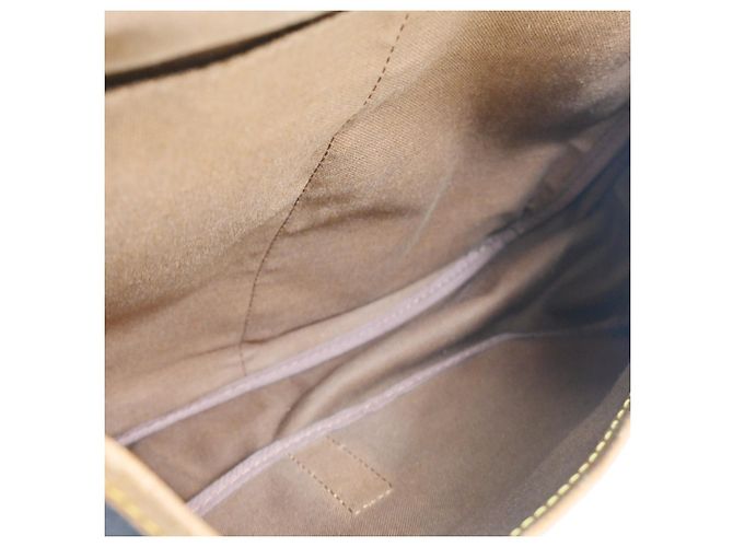 Louis Vuitton Saumur Monogram Canvas 35 Marrone - vista 3