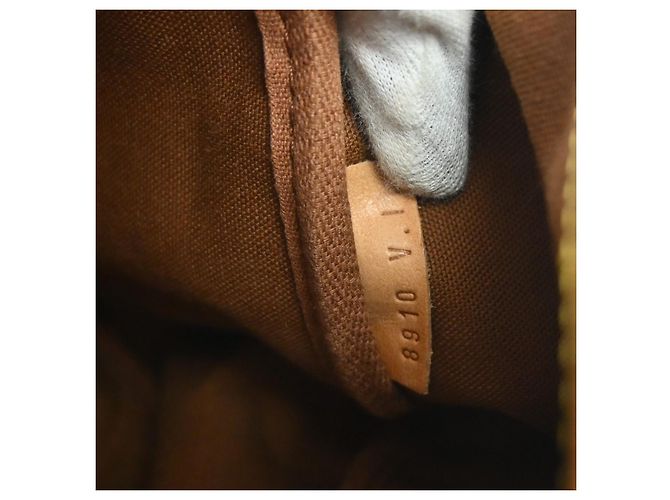 Louis Vuitton Saumur Monogram Canvas 35 Brown - view 5
