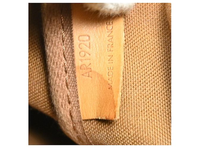 Louis Vuitton Saumur Monogram Canvas 35 Marrone - vista 4