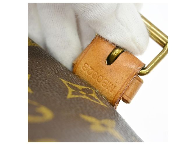 Louis Vuitton Saumur Monogram Canvas 35 Marrone - vista 5