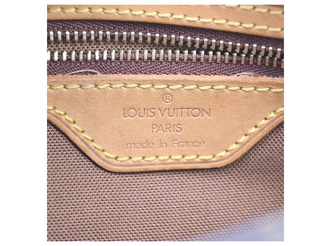 Louis Vuitton Trotteur Monogram Canvas Castaño - vista 4