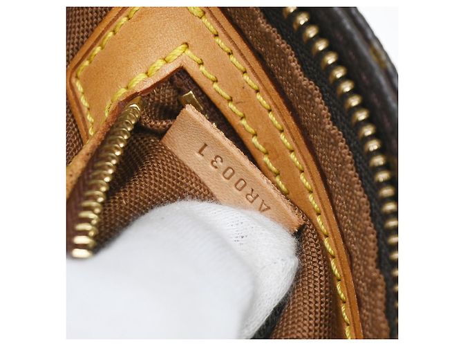 Louis Vuitton Trotteur Monogram Canvas Castaño - vista 5