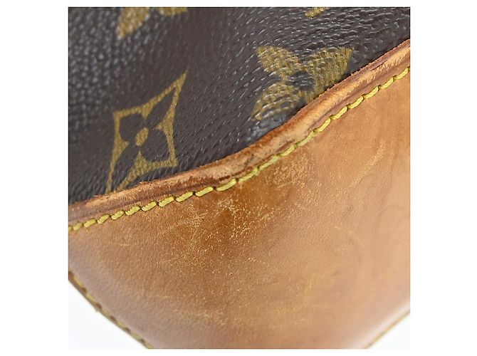 Louis Vuitton Trotteur Monogram Canvas Castaño - vista 7