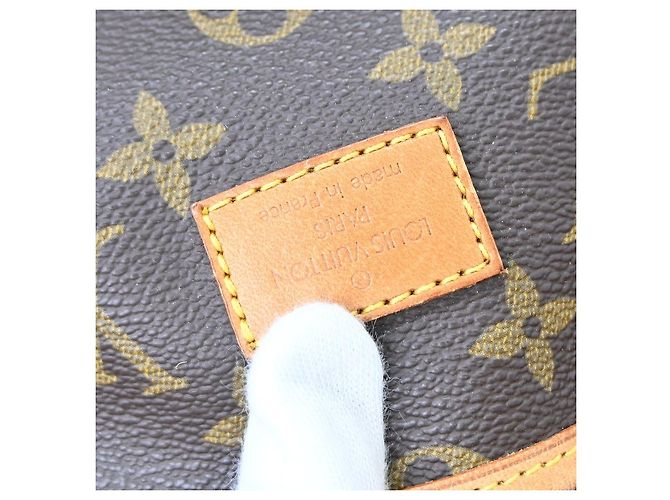 Louis Vuitton Saumur Monogram Canvas 35 Marrone - vista 4