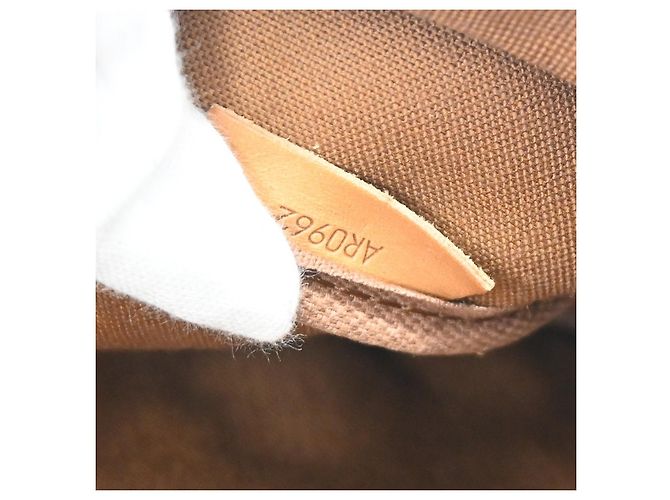 Louis Vuitton Saumur Monogram Canvas 35 Marrone - vista 5