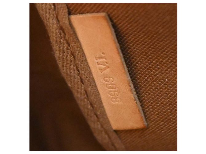 Louis Vuitton Saumur Monogram Canvas 35 Marrone - vista 5