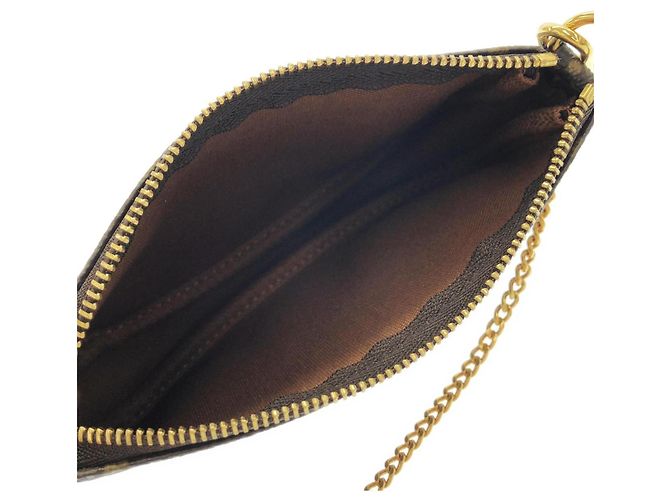 Louis Vuitton Monogram Mini Pochette Accessoires Marrone - vista 7