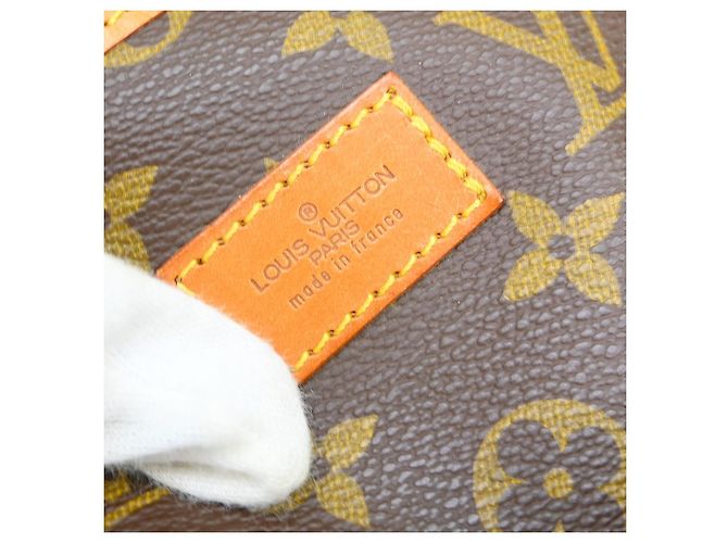 Louis Vuitton Saumur Monogram Canvas 35 Marrone - vista 4