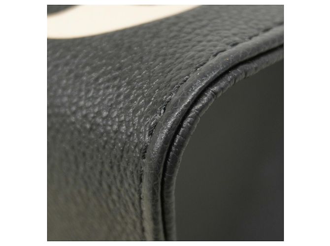 Borsa Tote Louis Vuitton Monogram Empreinte Bicolor OnTheGo MM Nero Beige - vista 6