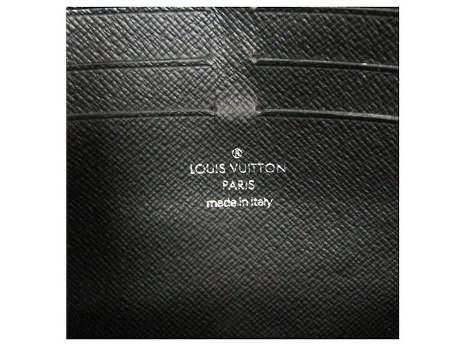 Pochette Voyage MM Monogram Eclipse Louis Vuitton Bolsa Clutch Monograma - vista 14