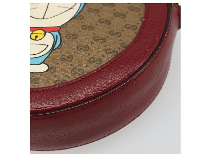 Borsa GUCCI Collaborazione Doraemon Micro GG Supreme PVC Beige 625216 Auth 185736M D'oro - vista 10