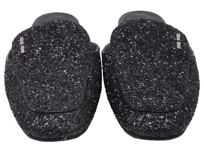Mules con purpurina en cuero negro Miu Miu - vista 2