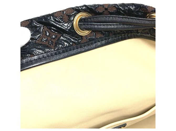Borsa Louis Vuitton Monogram Elvinyl Squeeze Marrone Nero - vista 10