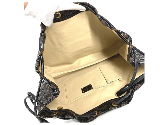 Borsa Louis Vuitton Monogram Elvinyl Squeeze Marrone Nero - vista 9
