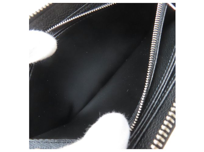 Cartera Zippy Louis Vuitton - Colección Empreinte Negro Blanco - vista 4