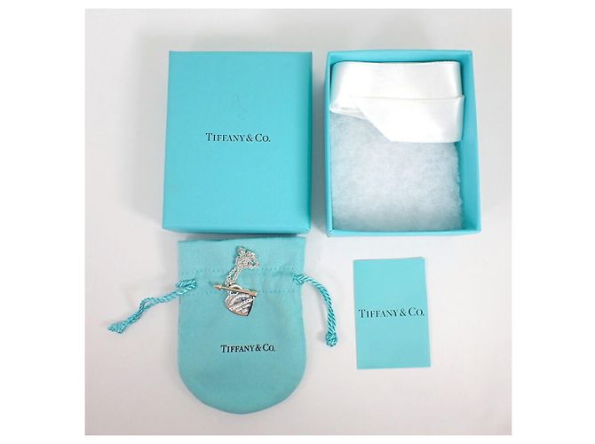 Bracciale con charm in argento sterling e oro giallo 18K di Tiffany & Co. - vista 9