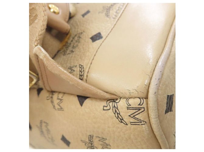 Mochila MCM com estampa total e tachas Bege - vista 22