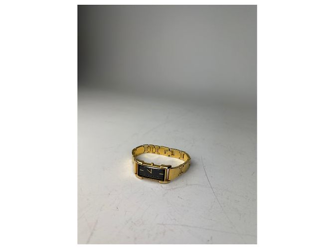 Yves Saint Laurent Orologio da polso vintage Saint Laurent, quadrante nero e oro D'oro - vista 11