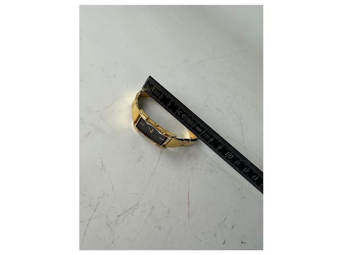Yves Saint Laurent Orologio da polso vintage Saint Laurent, quadrante nero e oro D'oro - vista 9