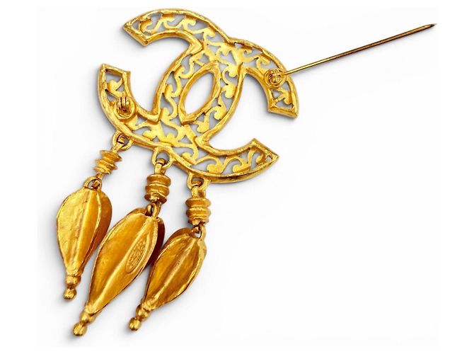 Broche Chanel Vintage 95A Coco Mark Dorado - vista 4