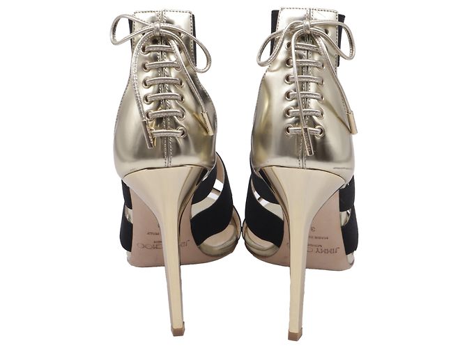 Sandali con tacco Jimmy Choo con cinturino elastico in pelle oro - vista 5