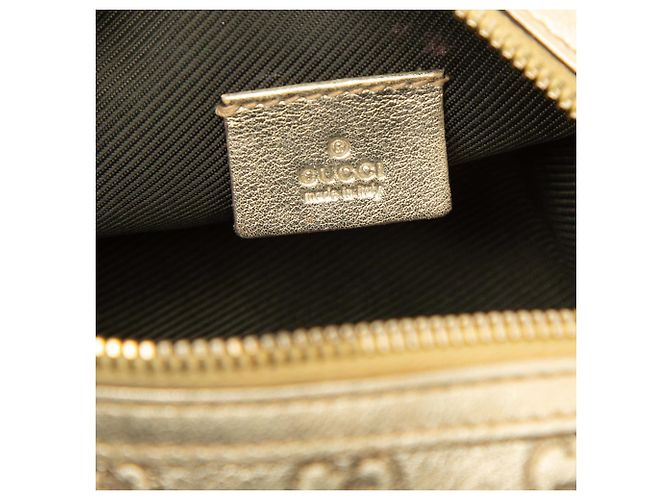 Neceser Gucci Gold Metallic Guccissima Dorado - vista 5