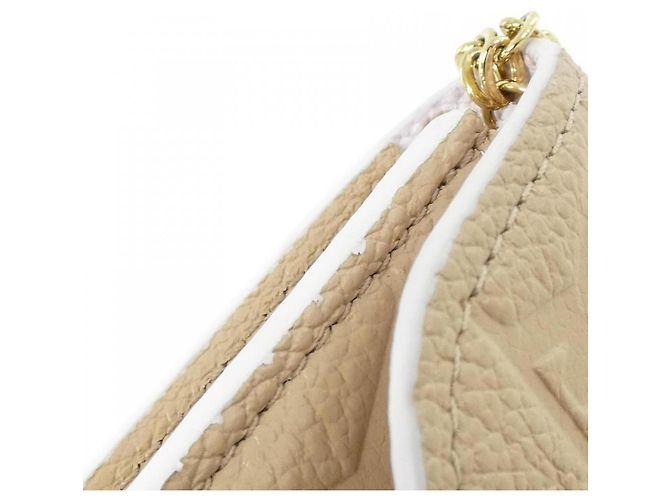 Monedero Monogram Empreinte Louis Vuitton Beige - vista 3