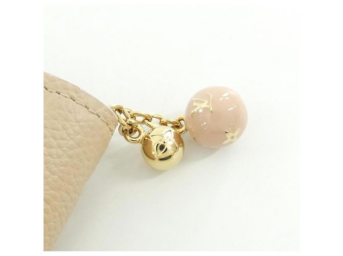 Monedero Monogram Empreinte Louis Vuitton Beige - vista 5