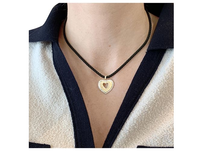 Pendente Poiray "Coeur Secret" in oro bicolore e diamanti. - vista 5