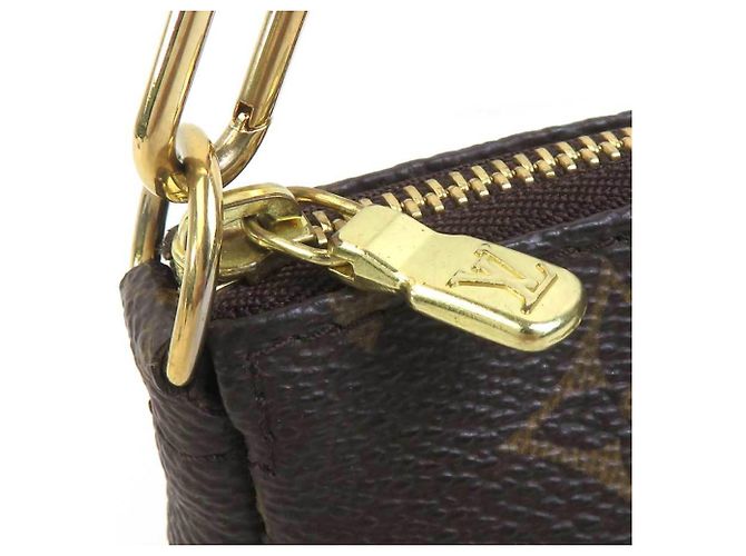 Louis Vuitton Monogram Mini Pochette Accessoires Marrone Monogramma - vista 8