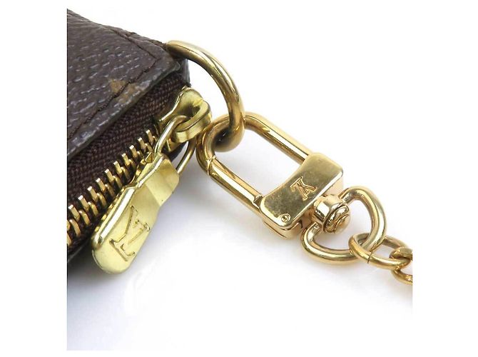 Louis Vuitton Monogram Mini Pochette Accessoires Marrone Monogramma - vista 9