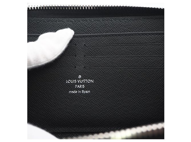 Portafoglio lungo Louis Vuitton Taiga Zippy Dragonne Noir Nero - vista 13