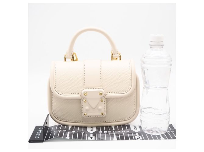 Borsa a tracolla Louis Vuitton Epi Hide and Seek M22720 Crudo - vista 3