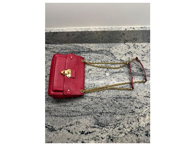 Borsa a tracolla Louis Vuitton Vavin Monogram Empreinte Twist MM in pelle rossa Rosso - vista 4