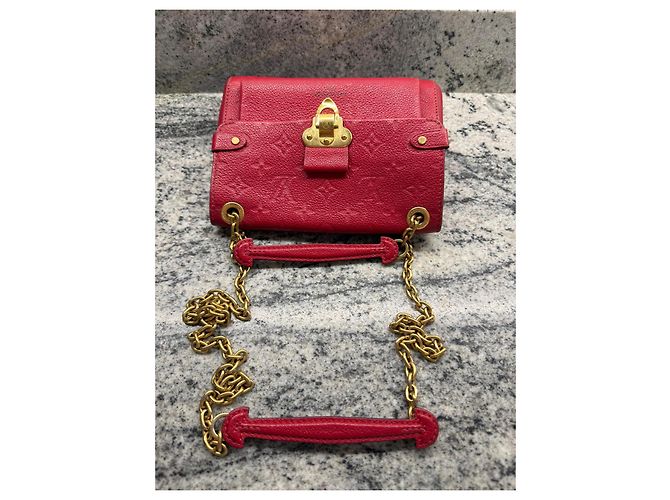 Borsa a tracolla Louis Vuitton Vavin Monogram Empreinte Twist MM in pelle rossa Rosso - vista 5