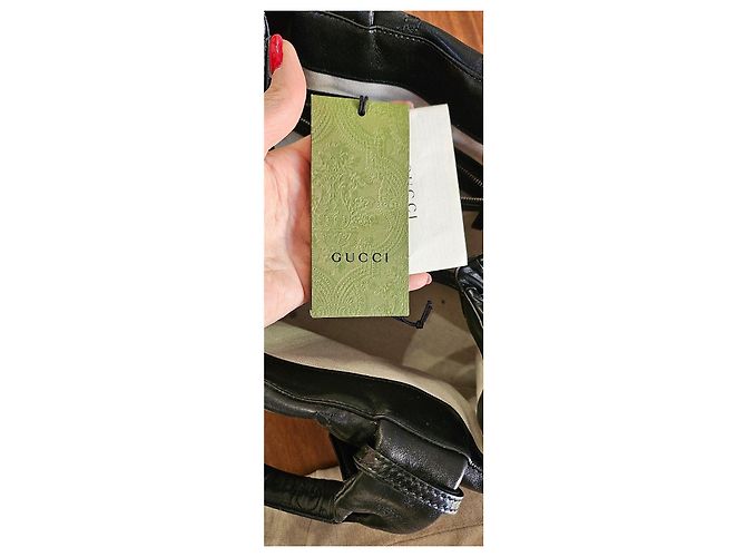 Bolsa Gucci em couro preto acolchoado com logo GG - vista 10