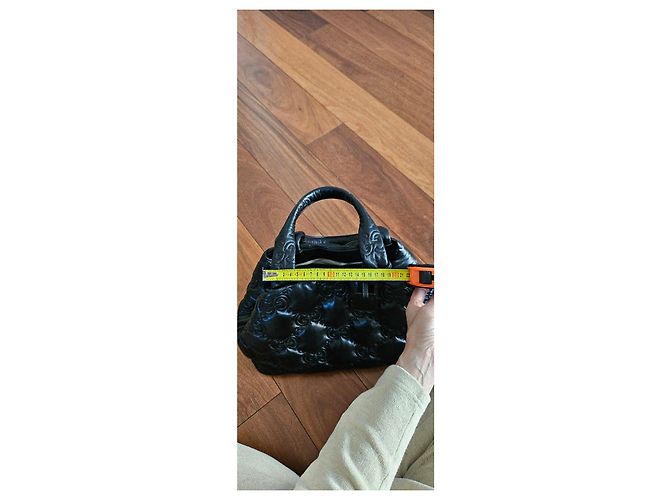 Bolsa Gucci em couro preto acolchoado com logo GG - vista 14