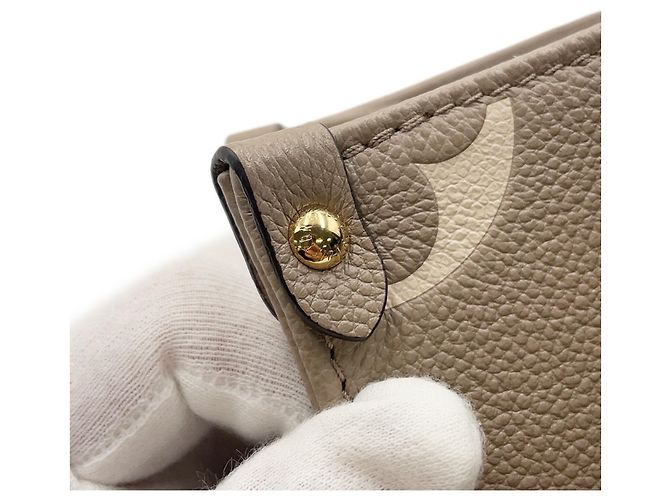 Borsa Louis Vuitton Monogram Empreinte OnTheGo PM Multicolore Monogramma - vista 9