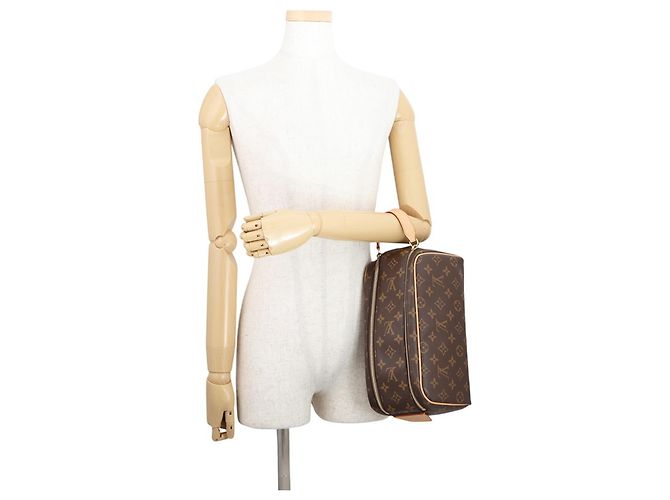 Clutch Louis Vuitton Monogram Dopp Kit Marrone Monogramma - vista 4